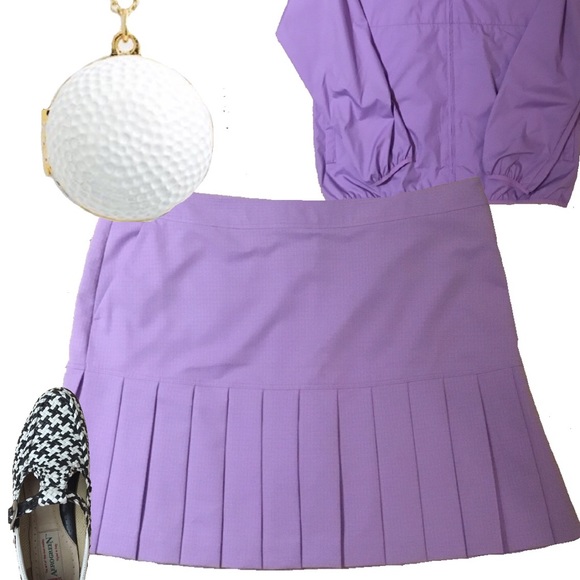 Izod Dresses & Skirts - NWT IZOD golf skort with built in shorts.